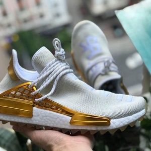 human race gold and white